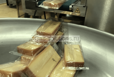 Упаковка сыра в МГС